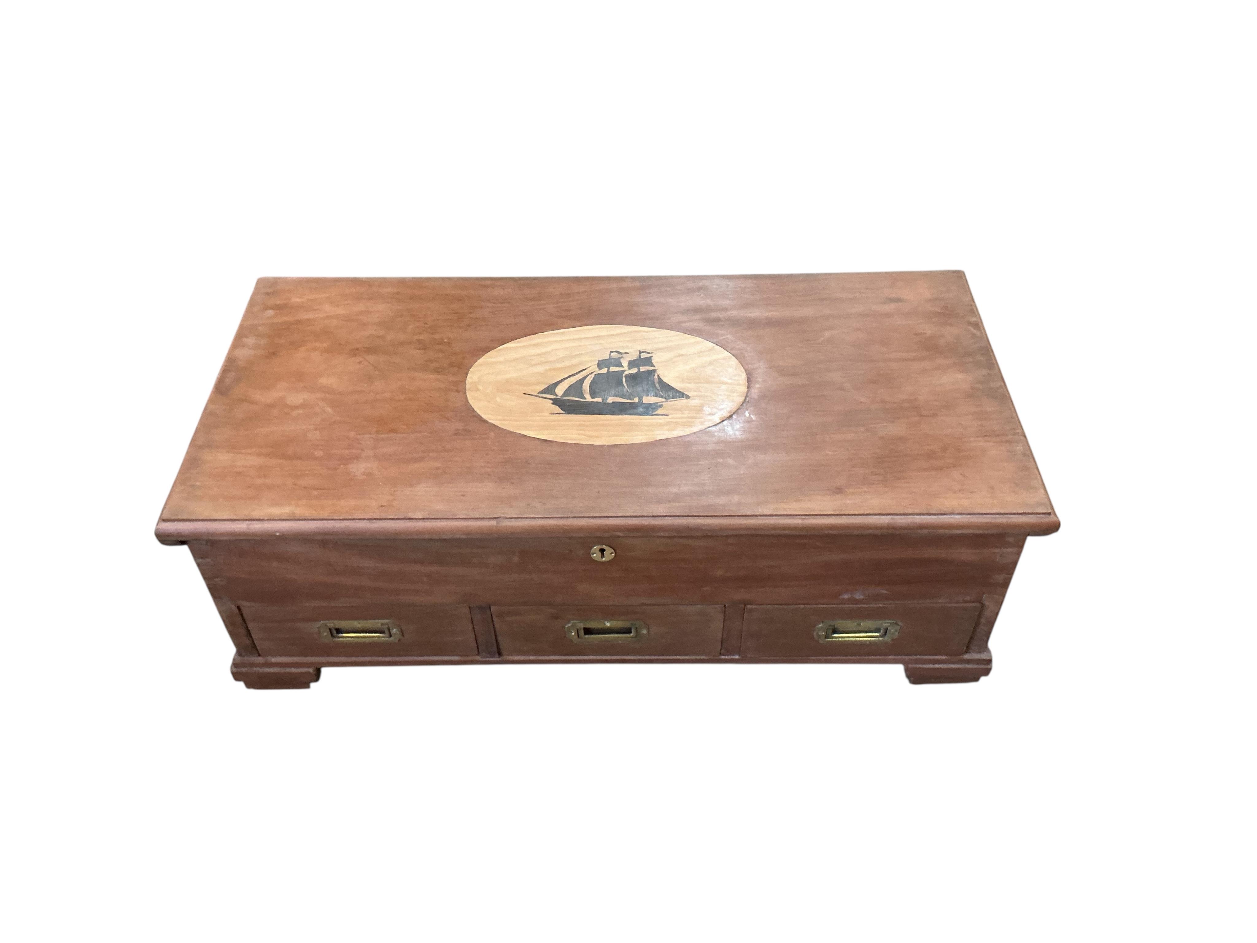 A modern inlaid mahogany three drawer trunk, width 90cm, depth 44cm, height 30cm